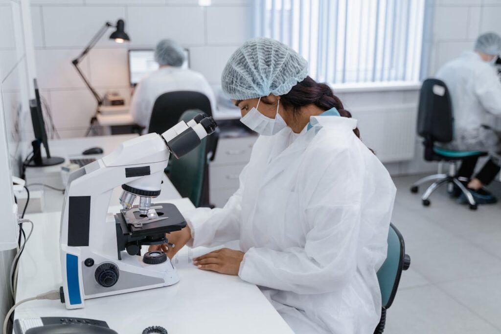 Medical Professional using Microscope